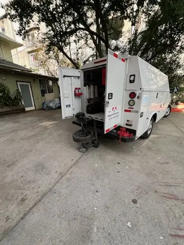 Magnet Plumbing service vehicle on-site for Water Heater Repair in Silver Beach
